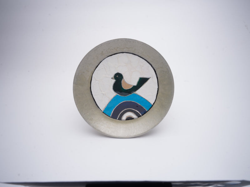 Nightingale Plate — grey-rimmed plate with a bird on a cobalt arch
