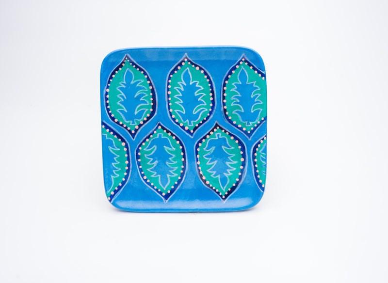 Azure Leaf Plate — blue square plate with stylized teal leaves