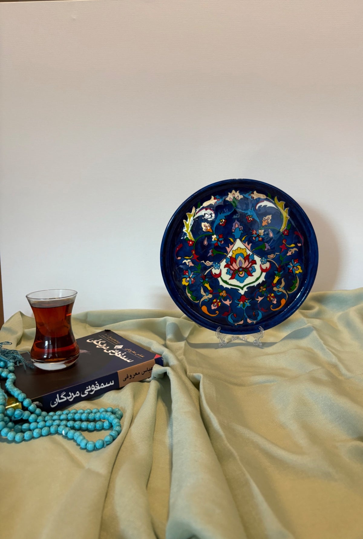Midnight Garden Plate — deep blue plate with hand-painted Persian floral vines