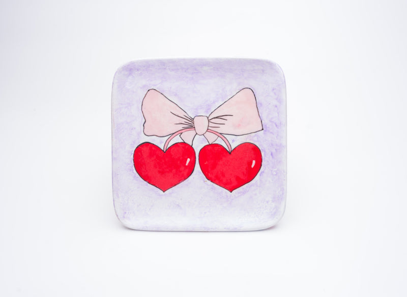 Sweetheart Bow Plate — lavender plate with two red hearts and a pink bow